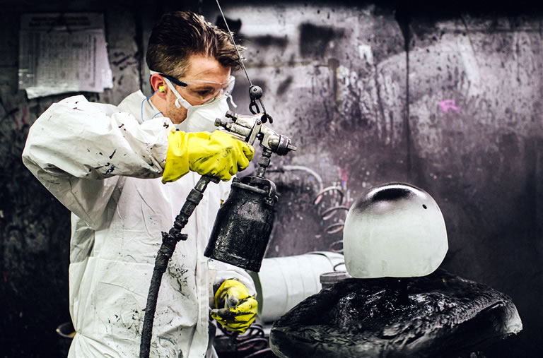 spraying a riding hat